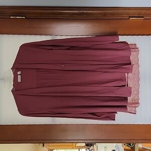 Cardigan. Size small. 1 botton. Logo brand